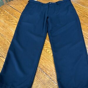 Haggar navy blue polyester dress slacks. Classic Fit.Size 38x29.  New with tags.